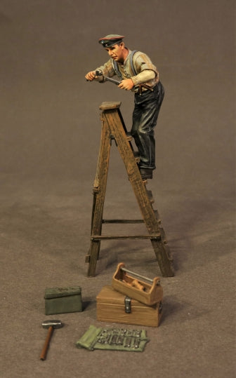 GERMAN MECHANIC ON LADDER