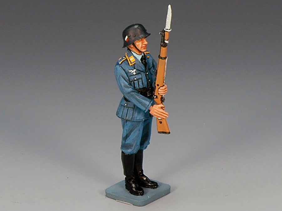 Standing Airman Presenting Arms