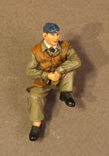 GROUND CREWMAN SITTING