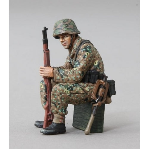 SS Soldier Sitting on Crate with Rifle