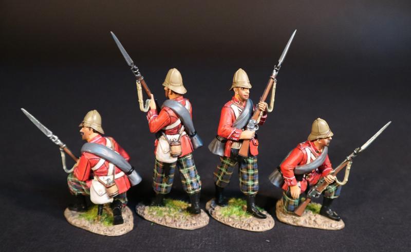 Four British Infantry Highlanders (2 standing ready, 2 kneeling reaching for ammo)